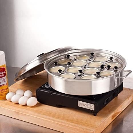 https://chefsdepot.ca/wp-content/uploads/2023/07/Royal-industries-Aluminum-Egg-Poacher-12-Cup-with-lid-02.jpg